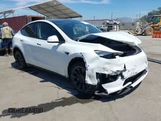 2022 Tesla Model Y Long Range z VIN 7SAYGDEE3NF413701, wystawiony jako IAAI lot #43045999 z przebiegiem 17 042 mil mil oraz . Historia ofert i sprzedaży dostępna na DreamBid. Obrazek 1.