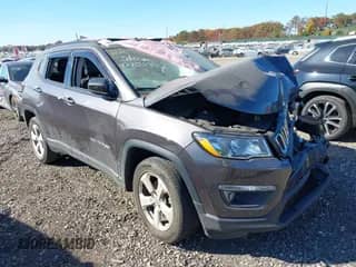 2021 Jeep Compass Latitude with VIN 3C4NJDBB8MT537958, listed as a IAAI auction lot 40705924 with 73,319 mi miles and . Bid and sale history available at DreamBid. Image 1.
