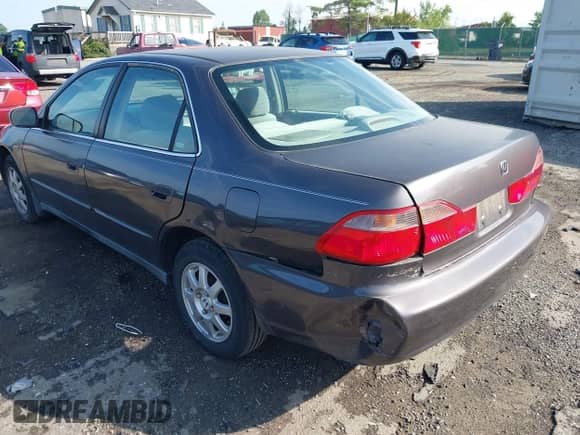 1999 Honda Accord LX with VIN 1HGCG6654XA100896, listed as a IAAI auction lot 42613354 with 154,176 mi miles and . Bid and sale history available at DreamBid. Image 6.