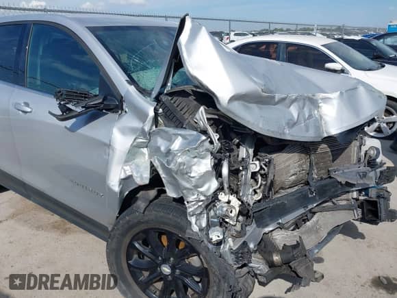 2020 Chevrolet Equinox LT with VIN 2GNAXTEV4L6134230, listed as a IAAI auction lot 43399800 with 122,008 mi miles and . Bid and sale history available at DreamBid. Image 18.