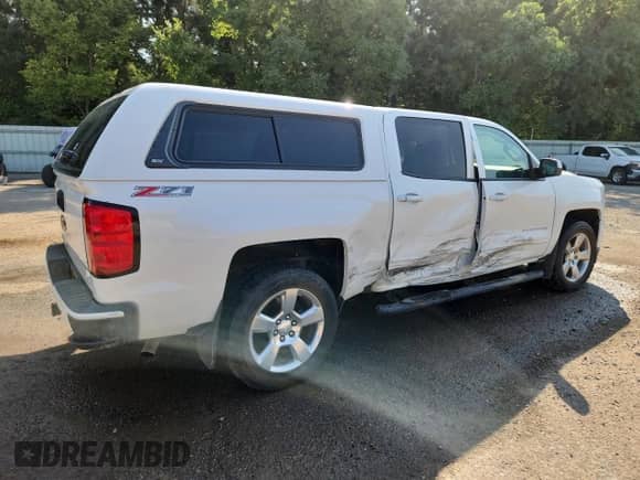 2017 Chevrolet Silverado 1500 LT with VIN 3GCUKREC0HG328559, listed as a Copart auction lot 81446685 with 135,540 mi miles and Salvage title. Bid and sale history available at DreamBid. Image 3.