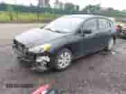 2013 Subaru Impreza 2.0i with VIN JF1GPAA68DG855146, listed as a IAAI auction lot 42611000 with 50,375 mi miles and . Bid and sale history available at DreamBid. Image 2.