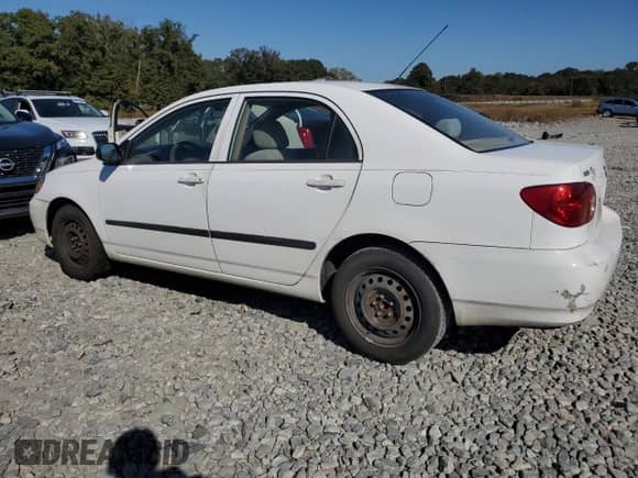 2004 Toyota Corolla CE with VIN JTDBR32E142042261, listed as a Copart auction lot 90053425 with 299,999 mi miles and Clean title. Bid and sale history available at DreamBid. Image 2.