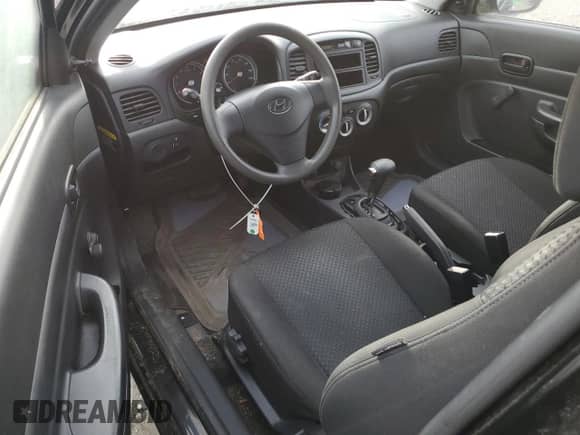 2010 Hyundai Accent GS z VIN KMHCM3AC6AU171014, wystawiony jako Copart lot #52543935 z przebiegiem Nie podano mil oraz Szkoda całkowita • Salvage title. Historia ofert i sprzedaży dostępna na DreamBid. Obrazek 8.