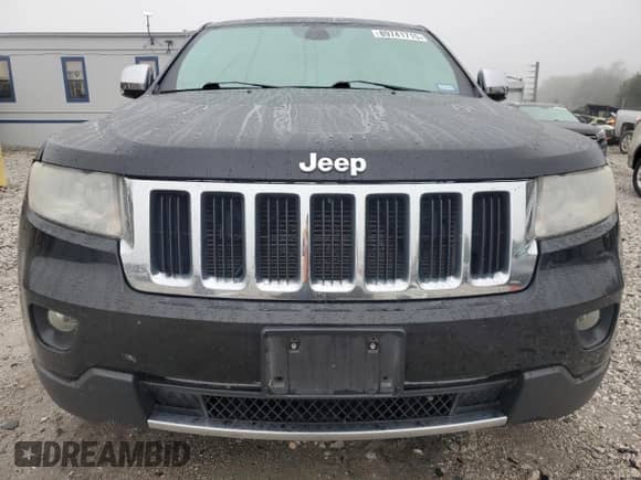 2013 Jeep Grand Cherokee Limited z VIN 1C4RJEBG0DC642363, wystawiony jako Copart lot #89741715 z przebiegiem 203 848 mil mil oraz Czysty tytuł • Clean title. Historia ofert i sprzedaży dostępna na DreamBid. Obrazek 5.