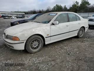1999 BMW 5 Series 528i с VIN WBADM633XXBY20578, выставлен на аукционе Copart как лот 68376904 с пробегом Не указан миль и Списание • Salvage title. История ставок и продаж доступна на DreamBid. Изображение 1.