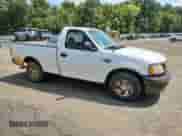 2001 Ford F-150 XL with VIN 1FTRF17W01NB97181, listed as a Copart auction lot 71320955 with Not provided miles and Salvage title. Bid and sale history available at DreamBid. Image 4.