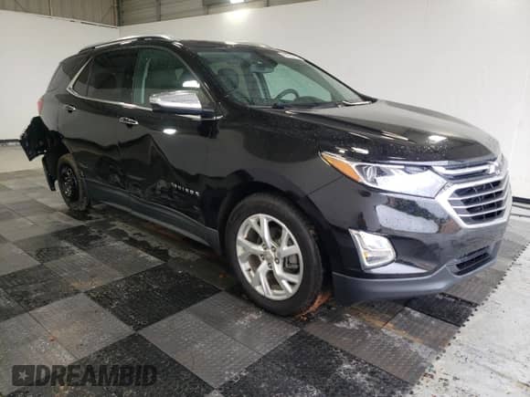 2021 Chevrolet Equinox Premier с VIN 2GNAXNEV6M6145551, выставлен на аукционе Copart как лот 67703725 с пробегом 54 188 миль миль и Списание • Salvage title. История ставок и продаж доступна на DreamBid. Изображение 4.