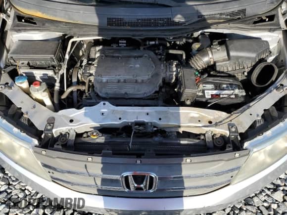 2013 Honda Odyssey LX с VIN 5FNRL5H27DB069809, выставлен на аукционе Copart как лот 70873915 с пробегом 108 085 миль миль и Чистый • Clean title. История ставок и продаж доступна на DreamBid. Изображение 12.