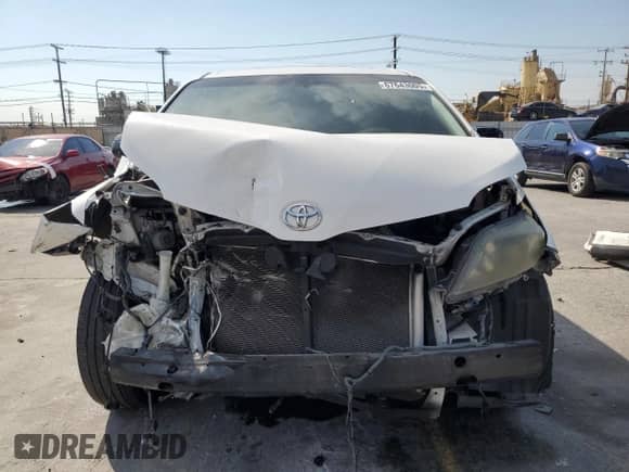 2011 Toyota Sienna SE with VIN 5TDXK3DC1BS105239, listed as a Copart auction lot 67643005 with 213,548 mi miles and Salvage title. Bid and sale history available at DreamBid. Image 5.