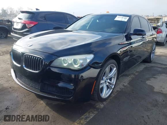 2013 BMW 7 Series 740Li with VIN WBAYE4C59DD136786, listed as a IAAI auction lot 42722440 with 126,170 mi miles and . Bid and sale history available at DreamBid. Image 2.