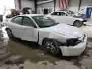 2004 Pontiac Grand Am SE1 with VIN 1G2NF52E84M669999, listed as a Copart auction lot 70597345 with 186,803 mi miles and Salvage title. Bid and sale history available at DreamBid. Image 4.