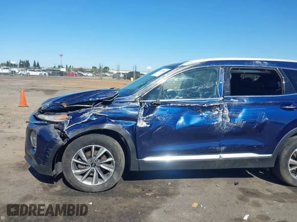 2019 Hyundai Santa Fe SEL Plus with VIN 5NMS33AD5KH104246, listed as a IAAI auction lot 43379674 with 128,473 mi miles and . Bid and sale history available at DreamBid. Image 6.