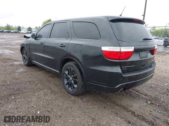 2013 Dodge Durango R/T with VIN 1C4SDJCT8DC638056, listed as a IAAI auction lot 42260663 with 201,316 mi miles and . Bid and sale history available at DreamBid. Image 3.