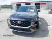 2021 Hyundai Santa Fe SE with VIN 5NMS14AJ0MH332918, listed as a IAAI auction lot 42365534 with 58,720 mi miles and . Bid and sale history available at DreamBid. Image 6.