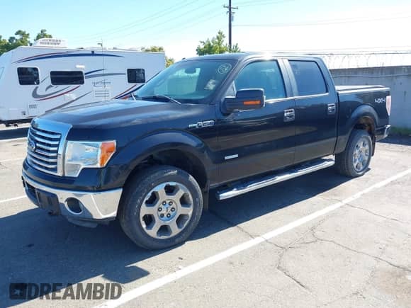 2012 Ford F-150 XL with VIN 1FTFW1ET8CKD14621, listed as a IAAI auction lot 43483309 with 183,135 mi miles and . Bid and sale history available at DreamBid. Image 2.