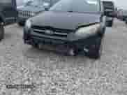 2014 Ford Focus Titanium with VIN 1FADP3N28EL205151, listed as a IAAI auction lot 43409829 with 126,461 mi miles and . Bid and sale history available at DreamBid. Image 12.