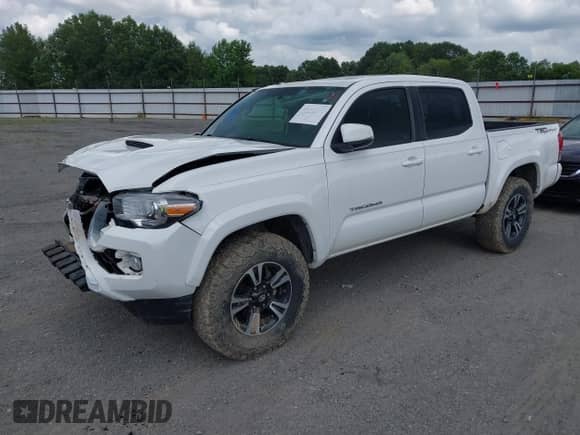 2017 Toyota Tacoma SR5 with VIN 5TFAZ5CN8HX027660, listed as a IAAI auction lot 42493030 with 83,763 mi miles and . Bid and sale history available at DreamBid. Image 2.