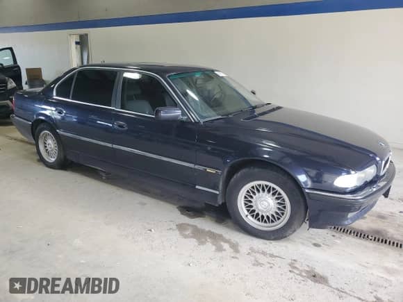2001 BMW 7 Series 740iL with VIN WBAGH83461DP21421, listed as a Copart auction lot 84357185 with 233,065 mi miles and Clean title. Bid and sale history available at DreamBid. Image 4.