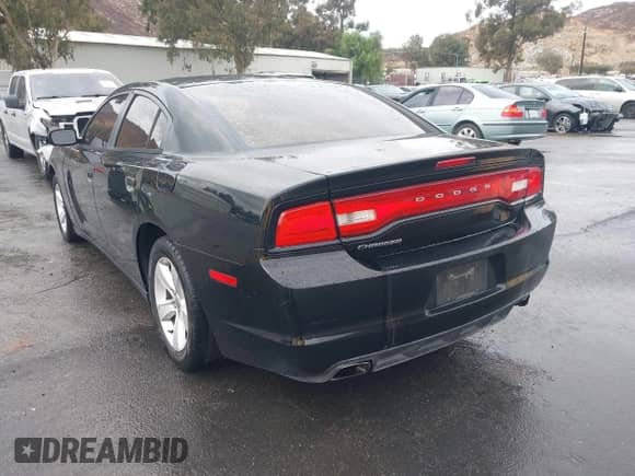 2014 Dodge Charger SE with VIN 2C3CDXBG0EH300844, listed as a IAAI auction lot 43406194 with 327,639 mi miles and . Bid and sale history available at DreamBid. Image 3.