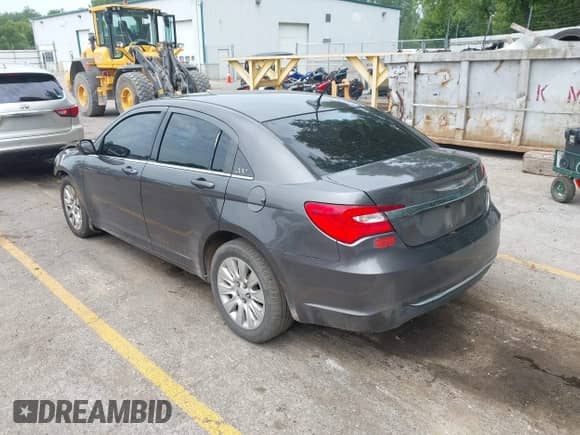 2014 Chrysler 200 LX with VIN 1C3CCBAB6EN204588, listed as a IAAI auction lot 42880103 with 112,465 mi miles and . Bid and sale history available at DreamBid. Image 3.