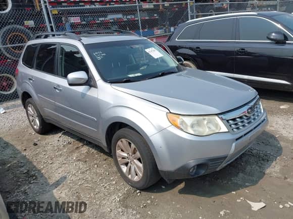 2013 Subaru Forester X Limited with VIN JF2SHAEC2DH441521, listed as a IAAI auction lot 42397403 with 130,000 mi miles and . Bid and sale history available at DreamBid. Image 1.