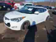 2012 Hyundai Veloster w/Gray Int z VIN KMHTC6AD3CU051669, wystawiony jako IAAI lot #41421833 z przebiegiem 170 000 mil mil oraz . Historia ofert i sprzedaży dostępna na DreamBid. Obrazek 2.