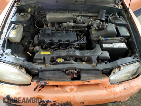 1997 Hyundai Accent z VIN KMHVD14NXVU221266, wystawiony jako Copart lot #86383044 z przebiegiem 159 517 mil mil oraz Szkoda całkowita • Salvage title. Historia ofert i sprzedaży dostępna na DreamBid. Obrazek 11.