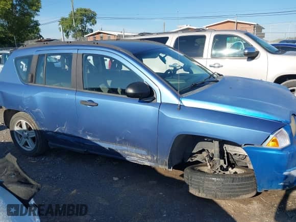 2007 Jeep Compass Sport with VIN 1J8FT47W47D194577, listed as a IAAI auction lot 43157689 with 175,153 mi miles and . Bid and sale history available at DreamBid. Image 12.