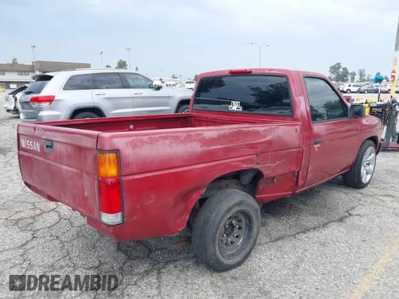 1994 Nissan Frontier with VIN 1N6SD11S3RC356695, listed as a IAAI auction lot 42408659 with 187,376 mi miles and . Bid and sale history available at DreamBid. Image 4.