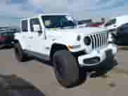 2021 Jeep Wrangler Unlimited Sahara z VIN 1C4JJXP63MW716690, wystawiony jako IAAI lot #42087879 z przebiegiem 40 889 mil mil oraz . Historia ofert i sprzedaży dostępna na DreamBid. Obrazek 1.