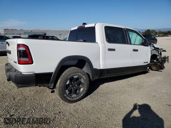2022 Ram 1500 Rebel z VIN 1C6SRFLT4NN158883, wystawiony jako Copart lot #69117124 z przebiegiem 45 447 mil mil oraz Czysty tytuł • Clean title. Historia ofert i sprzedaży dostępna na DreamBid. Obrazek 3.