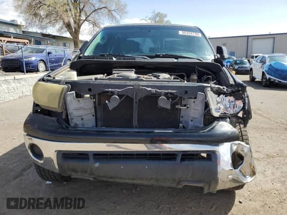 2012 Toyota Tundra z VIN 5TFRU5F10CX028076, wystawiony jako Copart lot #50353735 z przebiegiem 171 321 mil mil oraz Szkoda całkowita • Salvage title. Historia ofert i sprzedaży dostępna na DreamBid. Obrazek 5.