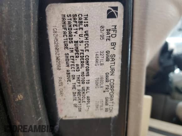 1995 Saturn SL with VIN 1G8ZH5280SZ302560, listed as a Copart auction lot 63290495 with 123,475 mi miles and Clean title. Bid and sale history available at DreamBid. Image 12.