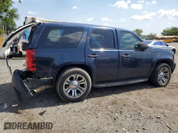2007 Chevrolet Tahoe Police с VIN 1GNEC030X7R390076, выставлен на аукционе Copart как лот 66219415 с пробегом 235 406 миль миль и Списание • Salvage title. История ставок и продаж доступна на DreamBid. Изображение 3.
