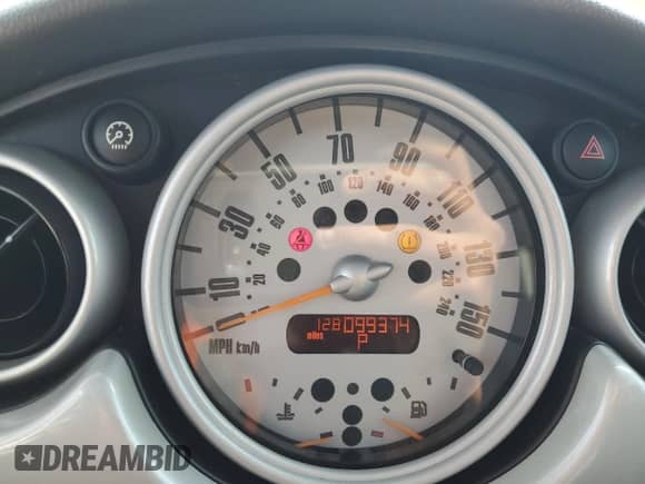 2004 MINI Hardtop with VIN WMWRC33454TJ56308, listed as a Copart auction lot 59690865 with 99,374 mi miles and Salvage title. Bid and sale history available at DreamBid. Image 9.