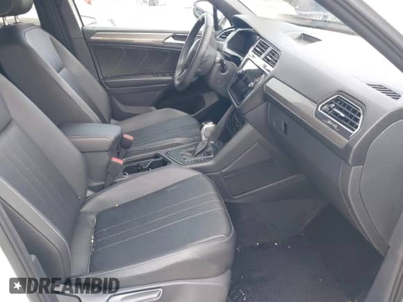 2023 Volkswagen Tiguan SE R-Line Black с VIN 3VVCB7AX0PM126184, выставлен на аукционе IAAI как лот 42676837 с пробегом 35 249 миль миль и . История ставок и продаж доступна на DreamBid. Изображение 5.