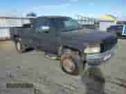 1996 Dodge 1500 with VIN 1B7HF16Z9TS558130, listed as a Copart auction lot 84706415 with 157,800 mi miles and Clean title. Bid and sale history available at DreamBid. Image 4.
