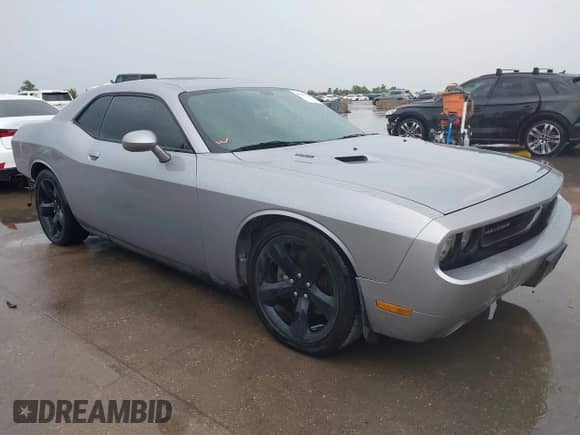 2014 Dodge Challenger R/T с VIN 2C3CDYBT1EH137110, выставлен на аукционе IAAI как лот 43291322 с пробегом 115 225 миль миль и . История ставок и продаж доступна на DreamBid. Изображение 1.