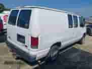 2014 Ford Econoline Cargo Commercial with VIN 1FTNE1EW6EDB07421, listed as a IAAI auction lot 42579240 with 205,890 mi miles and . Bid and sale history available at DreamBid. Image 4.