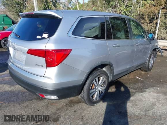 2017 Honda Pilot EX with VIN 5FNYF6H43HB105219, listed as a IAAI auction lot 41206317 with 104,839 mi miles and . Bid and sale history available at DreamBid. Image 4.