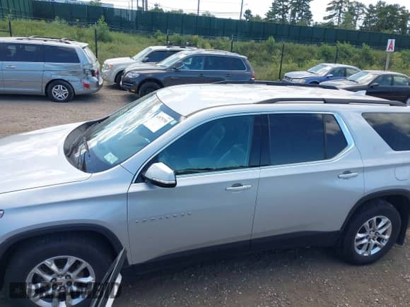 2021 Chevrolet Traverse LT с VIN 1GNEVHKW7MJ106833, выставлен на аукционе IAAI как лот 43079790 с пробегом 108 061 миль миль и . История ставок и продаж доступна на DreamBid. Изображение 14.