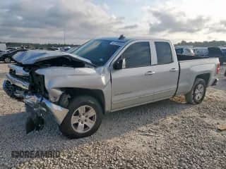 2018 Chevrolet Silverado 1500 LT with VIN 1GCRCREH1JZ298640, listed as a Copart auction lot 67139305 with 156,997 mi miles and Salvage title. Bid and sale history available at DreamBid. Image 1.