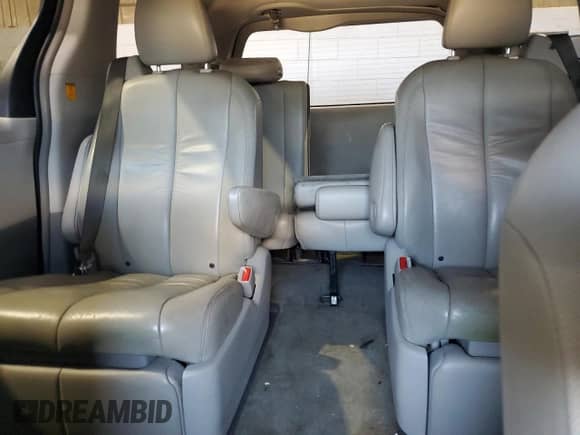 2012 Toyota Sienna XLE with VIN 5TDDK3DC9CS033551, listed as a Copart auction lot 69910445 with 210,288 mi miles and Salvage title. Bid and sale history available at DreamBid. Image 10.