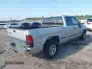 1998 Dodge 1500 z VIN 3B7HC12Y2WG125072, wystawiony jako IAAI lot #41985670 z przebiegiem 100 333 mil mil oraz . Historia ofert i sprzedaży dostępna na DreamBid. Obrazek 4.