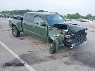 2021 Toyota Tacoma SR5 z VIN 3TMDZ5BN5MM118478, wystawiony jako IAAI lot #42828383 z przebiegiem 57 962 mil mil oraz . Historia ofert i sprzedaży dostępna na DreamBid. Obrazek 1.