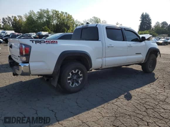 2022 Toyota Tacoma SR5 with VIN 3TMDZ5BN4NM130770, listed as a Copart auction lot 71835345 with 67,026 mi miles and Salvage title. Bid and sale history available at DreamBid. Image 3.