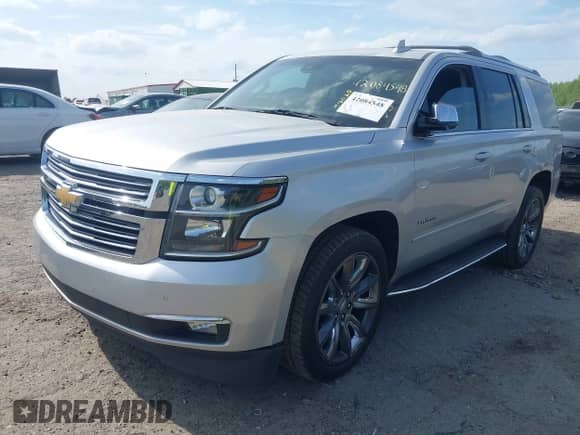 2017 Chevrolet Tahoe Premier with VIN 1GNSKCKC1HR335276, listed as a IAAI auction lot 42084548 with 191,627 mi miles and . Bid and sale history available at DreamBid. Image 2.