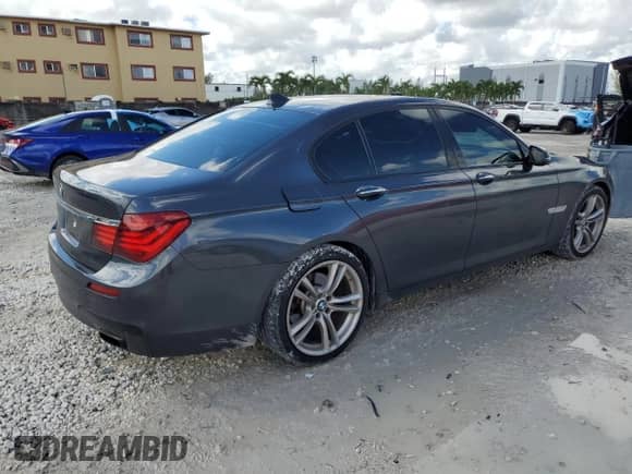 2015 BMW 7 Series 740i с VIN WBAYA6C50FGK16244, выставлен на аукционе Copart как лот 84005165 с пробегом 137 489 миль миль и Списание • Salvage title. История ставок и продаж доступна на DreamBid. Изображение 3.