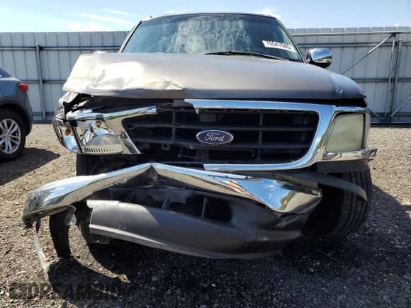 2002 Ford F-150 XL with VIN 1FTRX07222KD72716, listed as a Copart auction lot 70547045 with 267,336 mi miles and Salvage title. Bid and sale history available at DreamBid. Image 5.